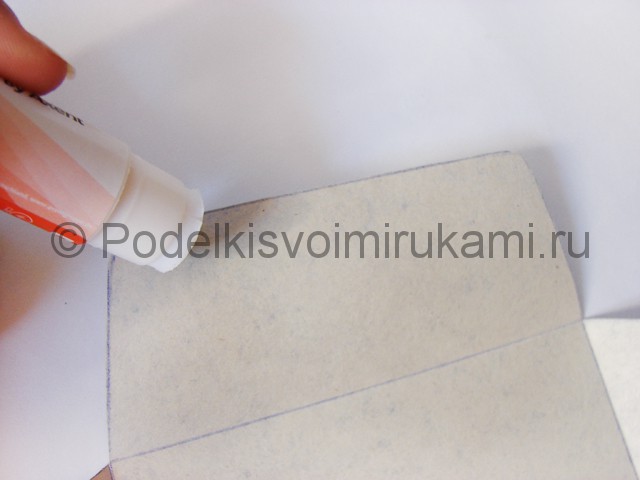 Как сделать конверт из бумаги. Фото 9.